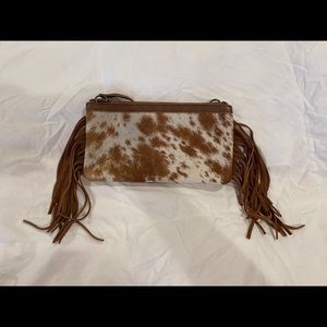 Cowhide fringe clutch
